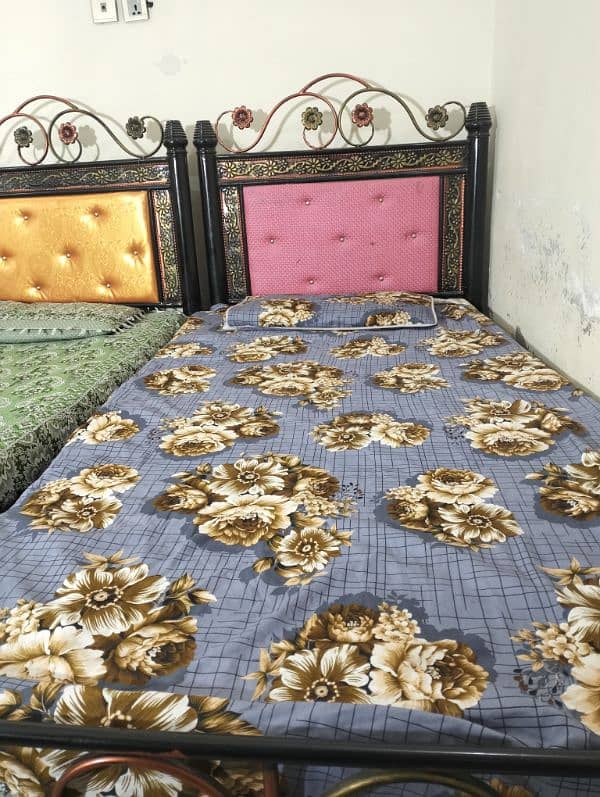 two single iron beds . . Rs. 18000 5