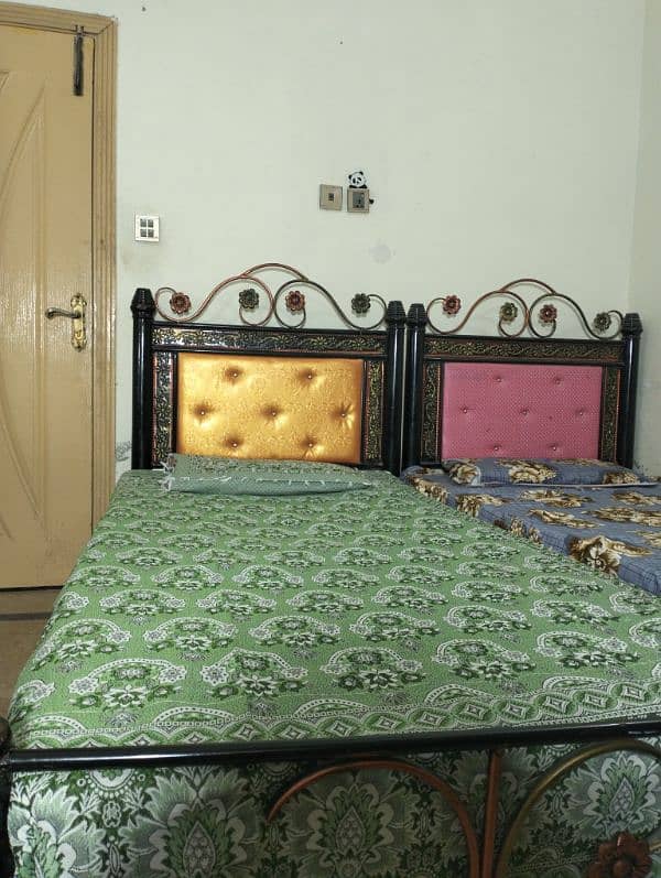 two single iron beds . . Rs. 18000 6