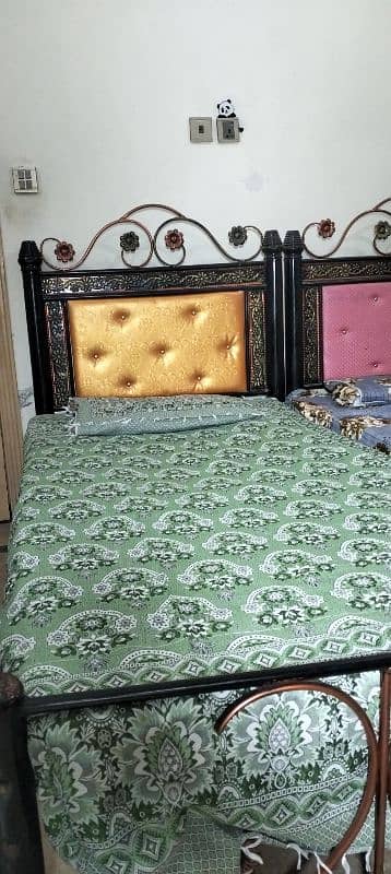 two single iron beds . . Rs. 18000 0