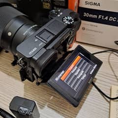 Sony a6400 with 30 mm sigma f1.4 Lense