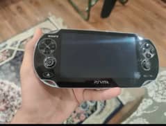 PS VITA OLED Mint condition with cover and installed games