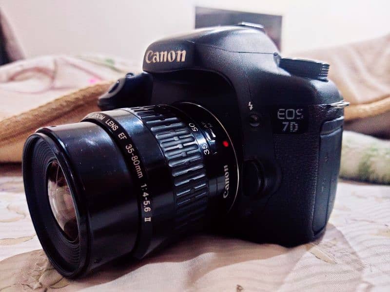 canon 7d mark i dslr camera with 35-80mm lens/sony/nikon 0