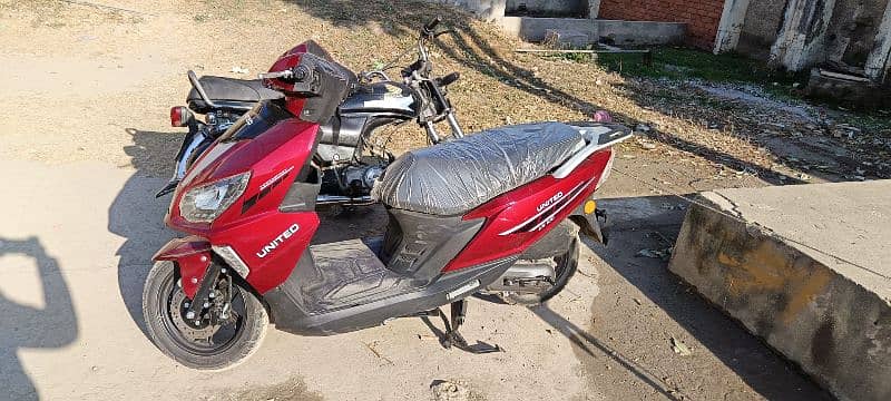 United Scooty 100 cc 9