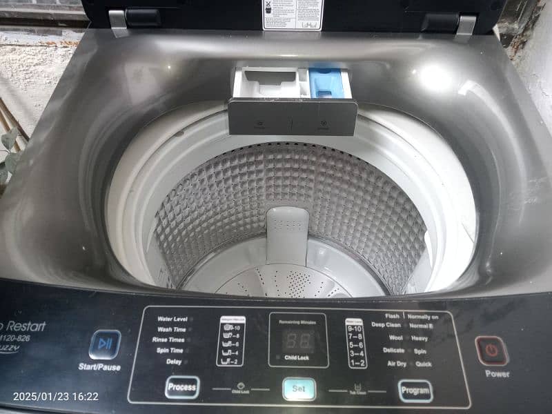 Haier fully automatic washing + dryer machine 2