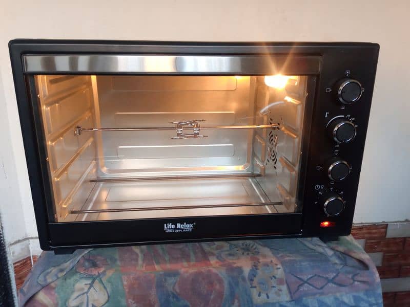 New Electric oven 70litr life relax 1 Year warranty, bake,roast,grill 1