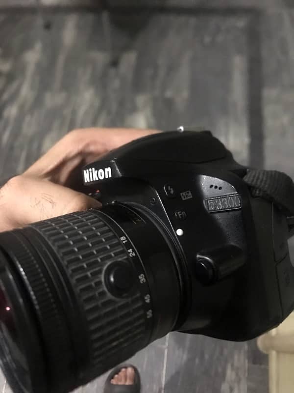 Nikon D3300 and 18:55 with box 11