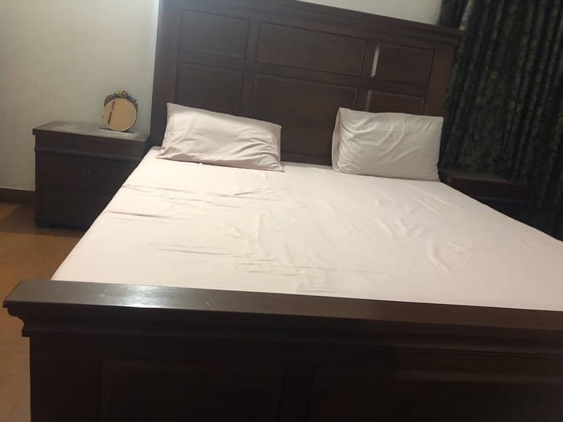 King size bed with 2 side tables and one dressing 2