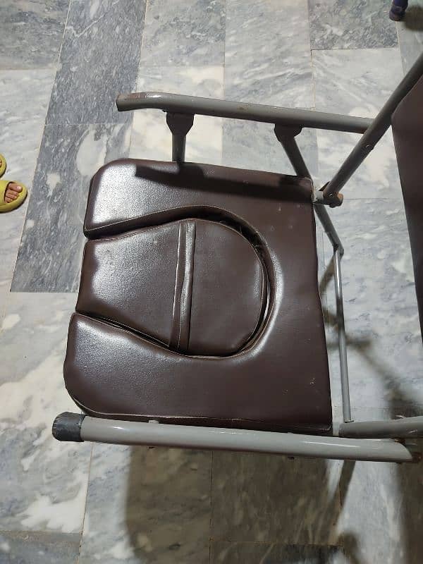 foldable commode chair toilet chair for sale in multan 2