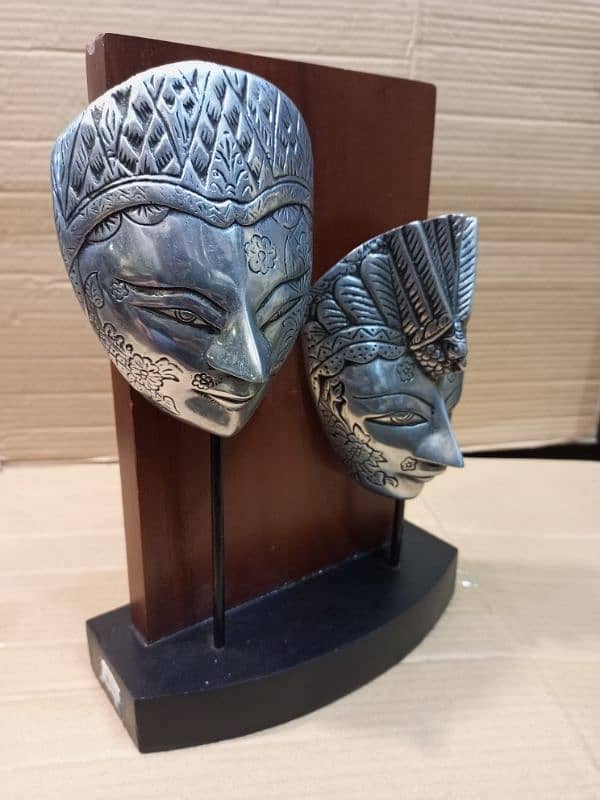 silver mask wooden stand art 1