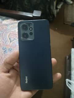 reamdi note 12 ik sal use kiya 50 ka daba pak liya tha