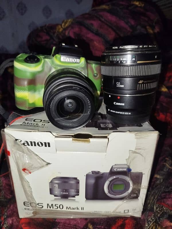 canon M50mark ii with 50 mm 1.4 usm and canon adapter 0