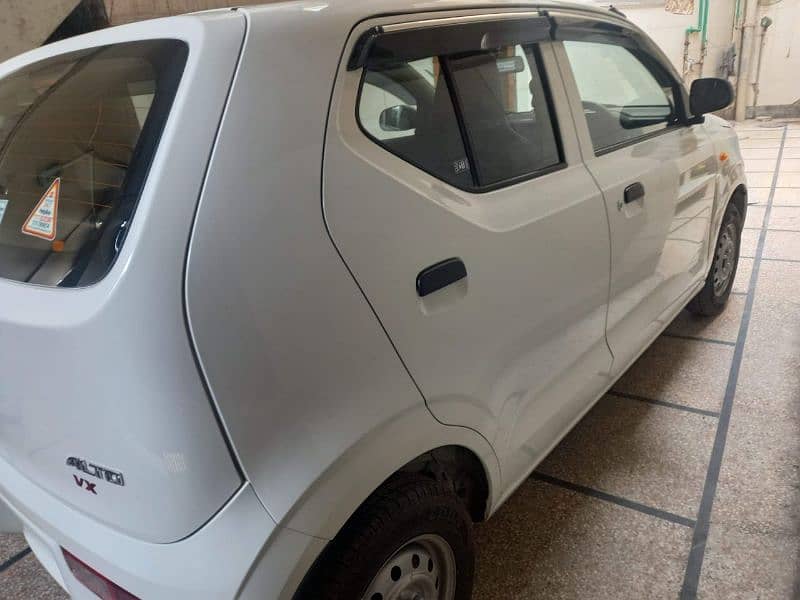 Suzuki Alto VX 2022 white colour 8