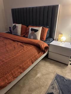 King Size Bed with 2 side tables. condition 8/10