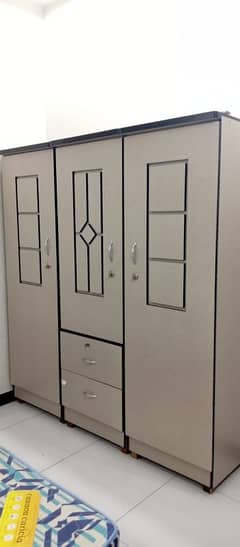 Three door wardrobe (almari)