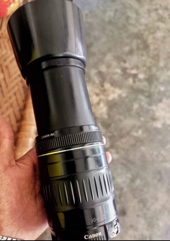 Canon lens 90/300 like  new  urgent sel  mingora swat 2