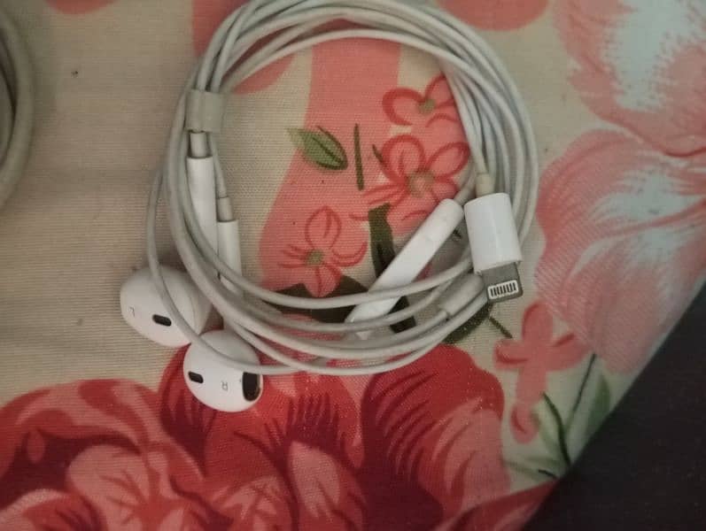 iPhone chargers and hand free. 6