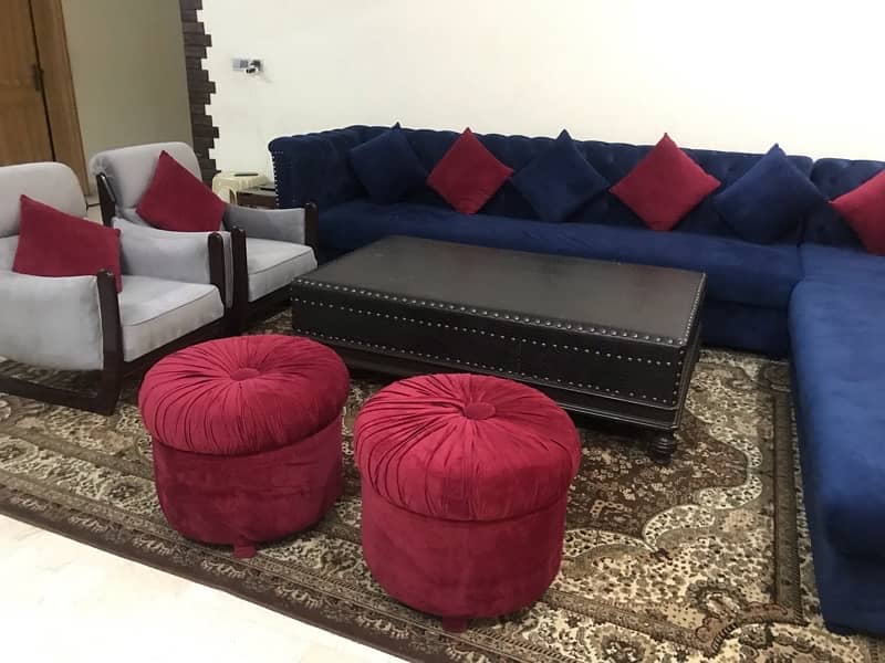 L shape sofa with different items . in very good condition like new. 0