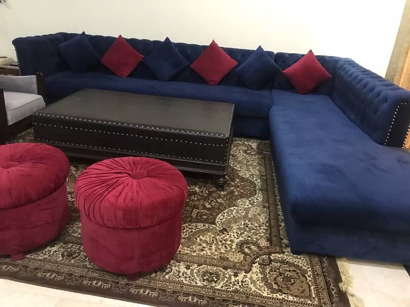 L shape sofa with different items . in very good condition like new. 1