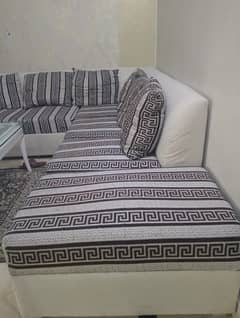 l shaped sofa and table in deco