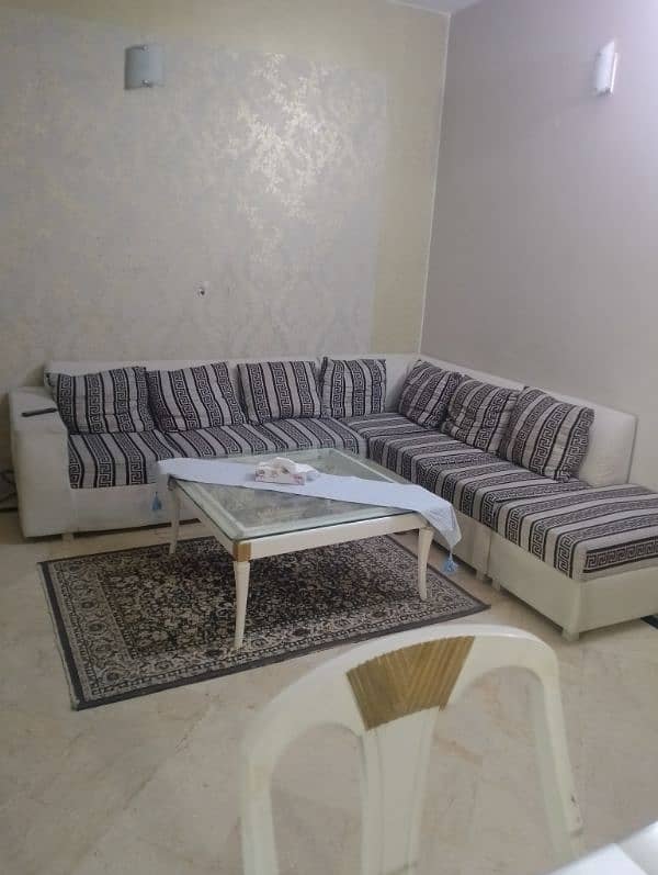 l shaped sofa and table in deco 1