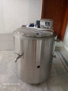 Electric Milk boiler.