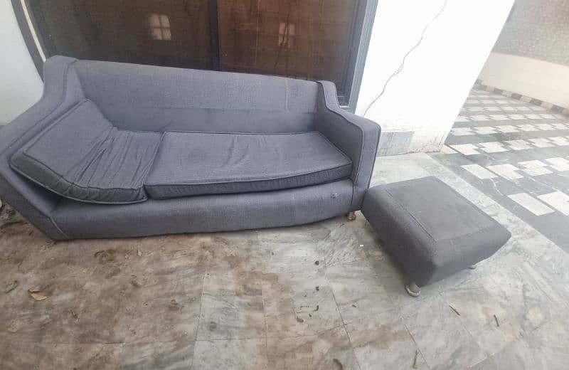 3 seatee sofa with 1 stool of same type 3