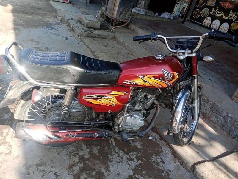 honda 125 red color 1