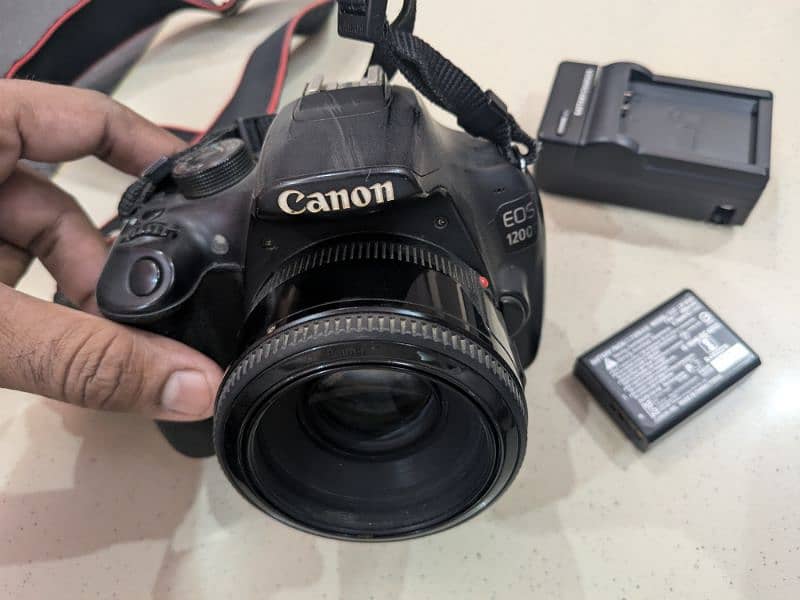 Canon 1200d DSLR with 50mm lens all ok sealed btr camera all ok 1300d 0