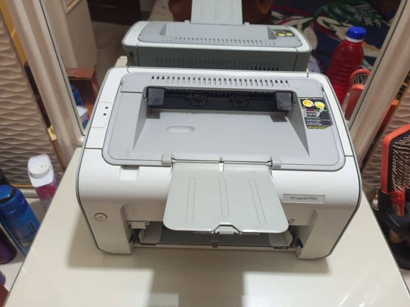 HP LASERJET P1102 FOR SALE IN PERFECTLY WORKING CONDITION KHI 1