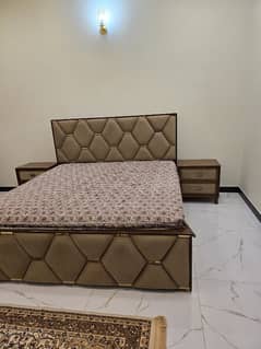 King size bed with dressing table and side tables