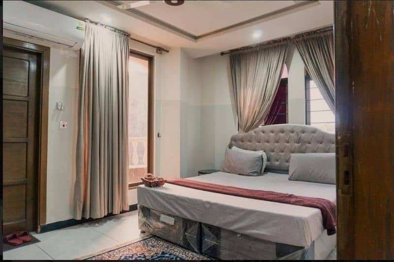 Fully furnished 1 Bed apartment Suites in Bahria town RWP Daily Basis 9