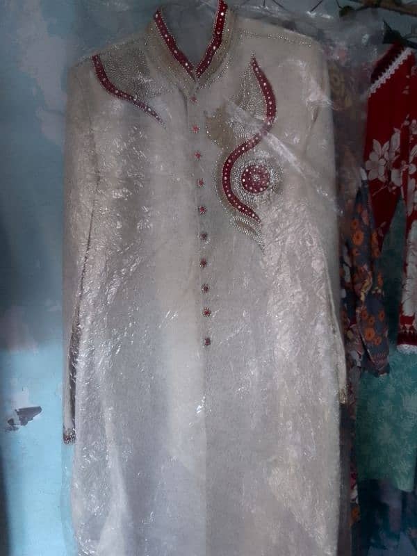 sherwani in cream colour 1