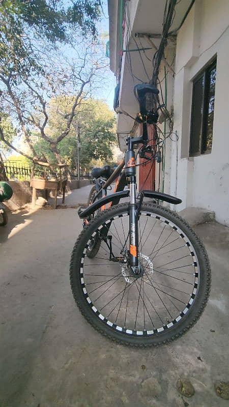 mountain bicycle 26 inchis shimano gears with front shok absorbers 19