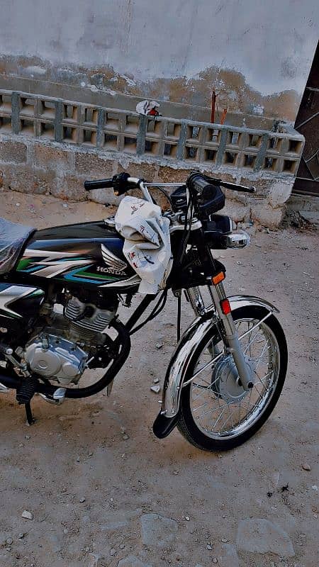 honda 125 karachi number 2023/6/21 12