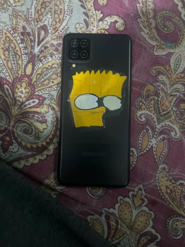 samsung a12  64 gb used 8/10 condition with box and charger 2