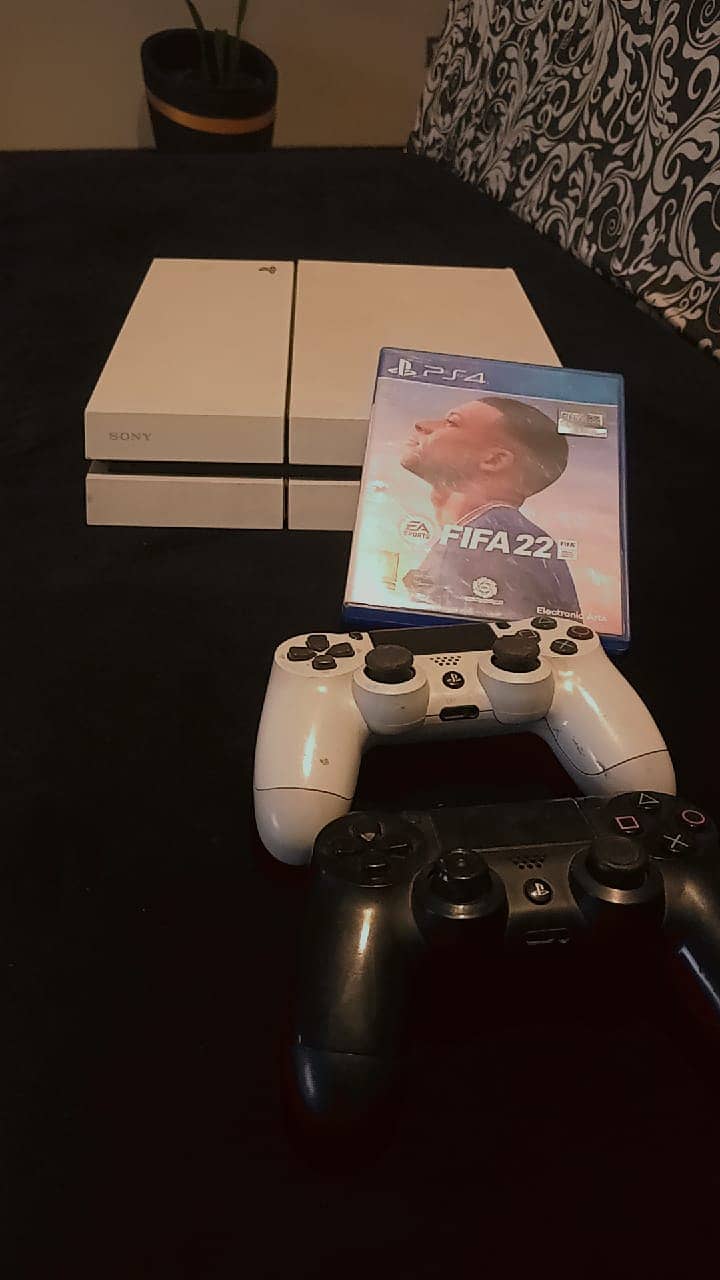 PLAY STATION 4 WITH FIFA 22 AND FIFA 15 0