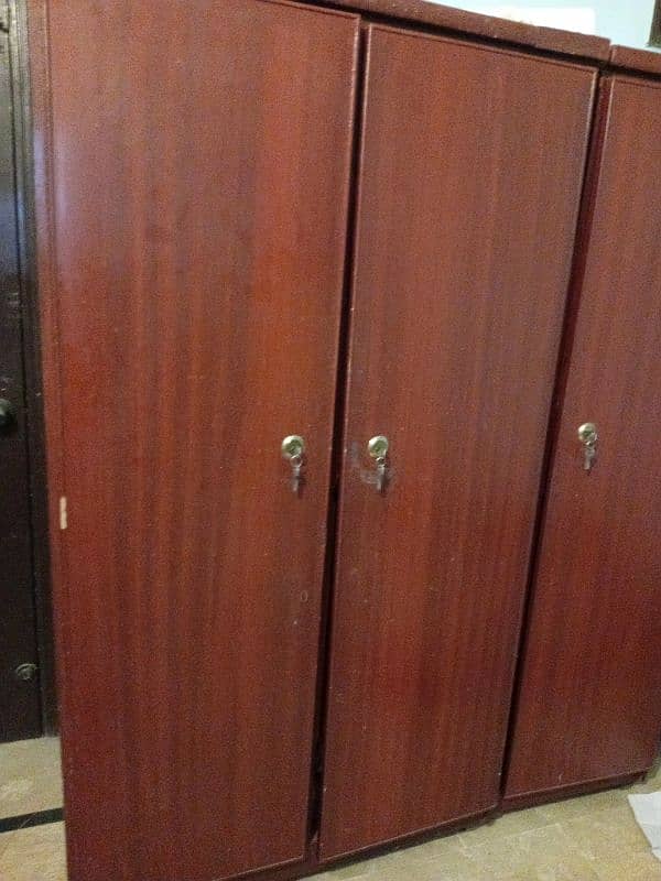 3 door woodens cupboard for sell 0