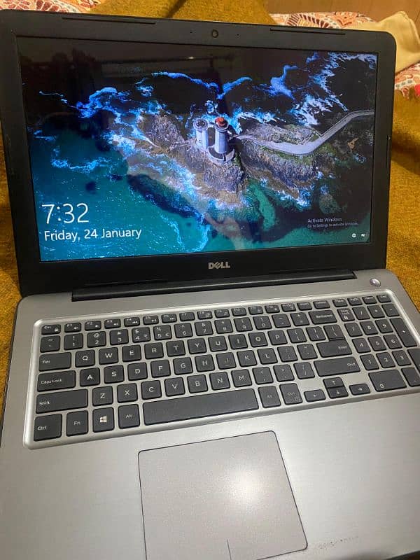 Dell Inspiron single handed used slim laptop 3