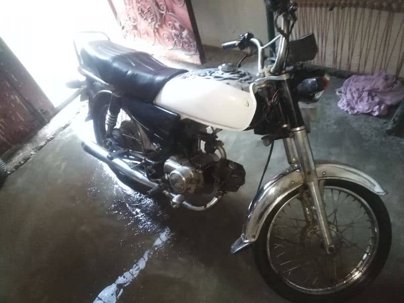 united 70cc 4