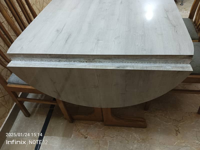 A very strong good quality foldable Dining Table with 6 chairs 1