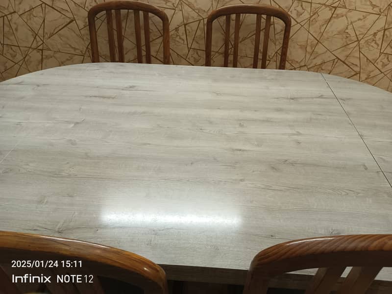 A very strong good quality foldable Dining Table with 6 chairs 4