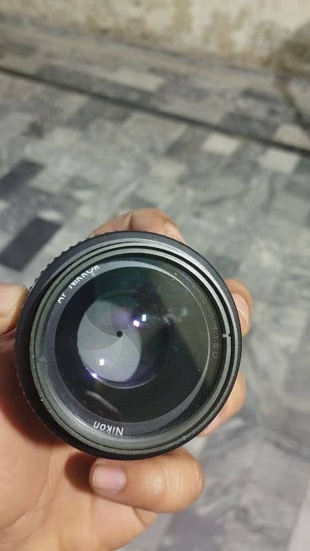 nikon 1.8-50mm AF lense 4