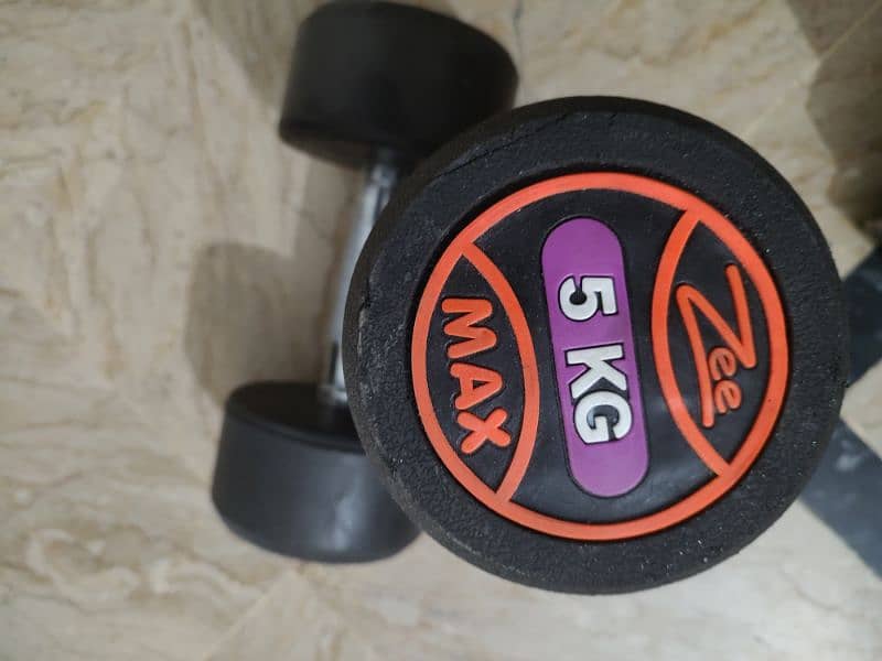 5kgs dumbells pair (5+5) rubber coated and abs roller and chest workou 0