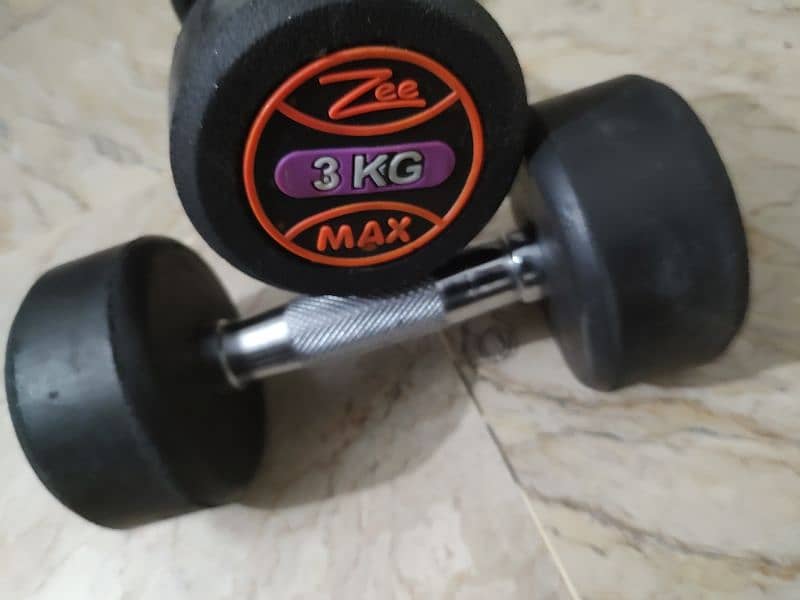 3kgs dumbells pair (3+3) rubber coated and abs roller and chest workou 3