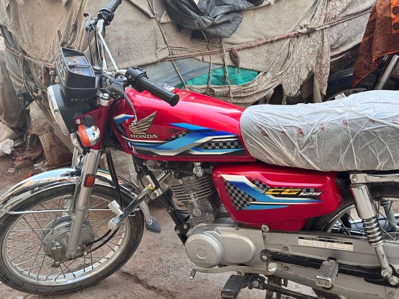 Honda 125 bike ok hai is number per contact Karen 03122865302 2