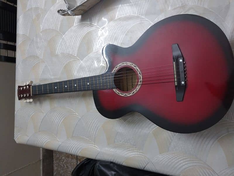 guitar with pick and bag 3