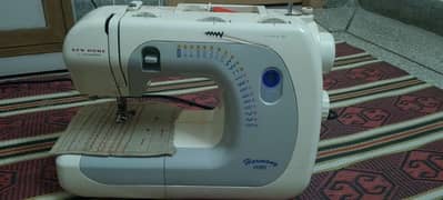 New Home sewing machine for sale.