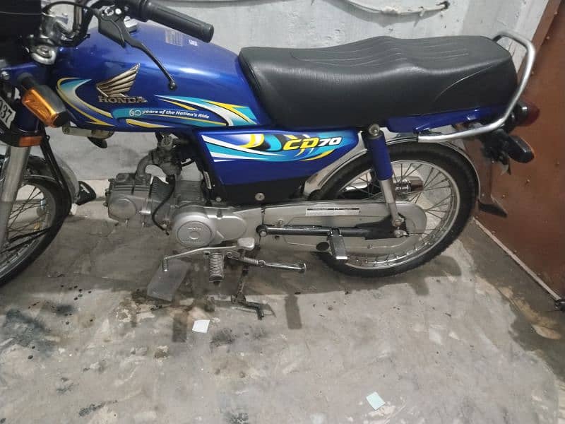 Honda CD 70 2024 03219599697 6