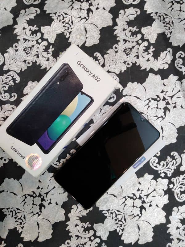 Samsung A02 with box charger 3