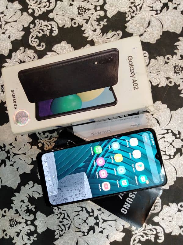 Samsung A02 with box charger 4